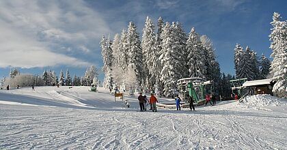 Silvesterreisen mit hoefer sport und reisen am Forellenhof an die Gerlitzen Alpe in Österreich. Skipiste