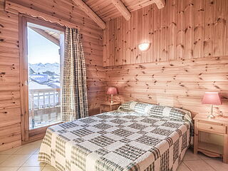 Schlafzimmer im 13er Chalet Nr.7 im Chalet le Crystal in La Rosiere in Frankreich.