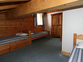 Schlafzimmer im 13er Chalet Nr.7 im Chalet le Crystal in La Rosiere in Frankreich.